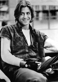 Film still photo print of Judd Nelson wearing a plaid shirt.