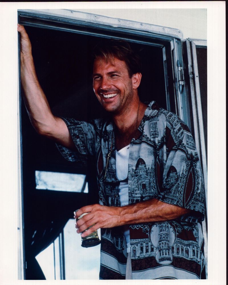 Kevin Costner smiling in doorway photo print from Tin Cup.