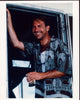 Kevin Costner smiling in doorway photo print from Tin Cup.