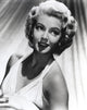 Lana Turner in a white gown photo print, classic Hollywood elegance.