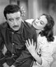 The Pink Panther photo poster print featuring Peter Sellers and Capucine from the 1963 film.