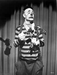 Emmett Kelly clown photo print showcasing the iconic performer in action.