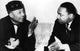 Martin Luther King Jr. speaking with Elijah Muhammad photo print