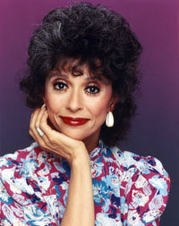 Rita Moreno smiling in a floral dress portrait photo print