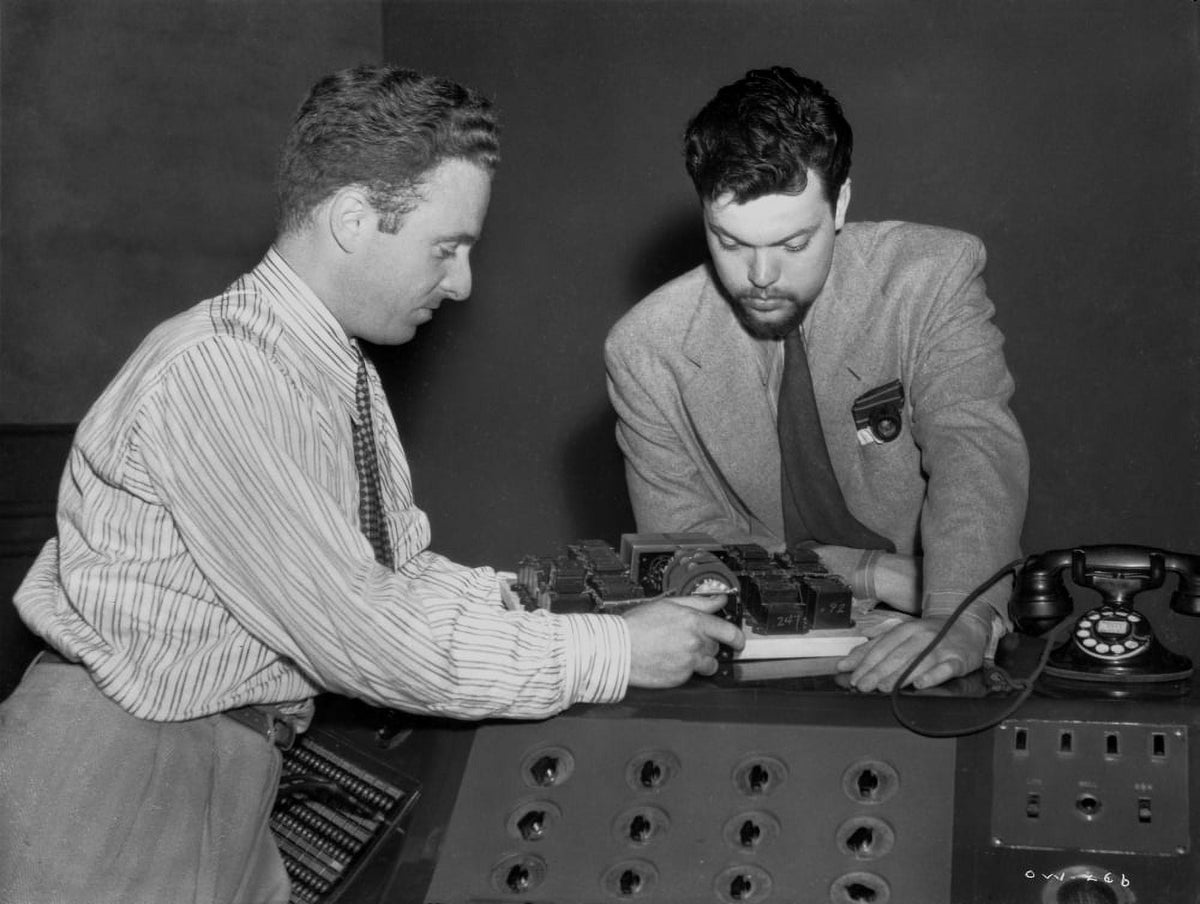 Black and white photo print of Orson Welles discussing