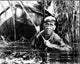 Humphrey Bogart pulling a boat in The African Queen black and white photo print