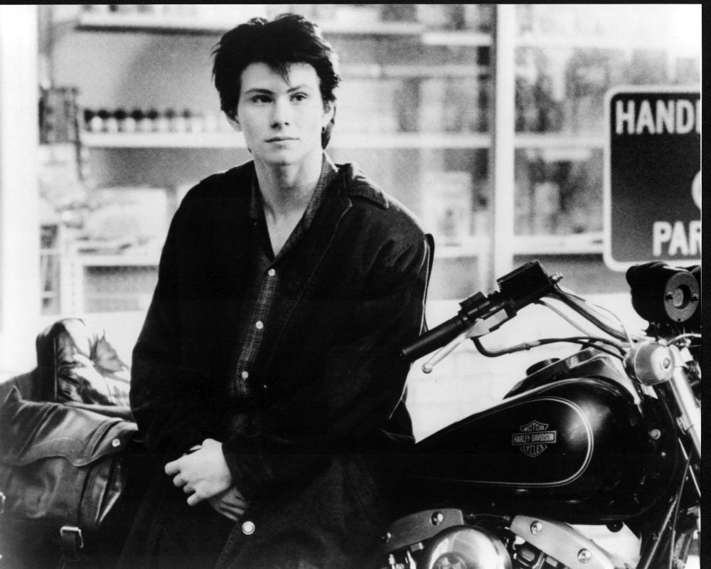 Christian Slater leaning on motorcycle in Heathers photo print