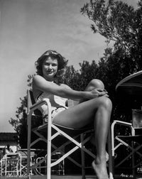 Grace Kelly in a classic bikini photo print, perfect for vintage decor.