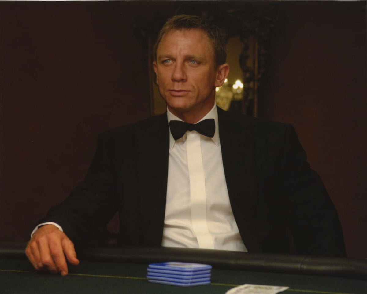 Daniel Craig seated in black tuxedo photo print