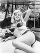 Jayne Mansfield in a swimsuit photo print showcasing vintage Hollywood glamour.