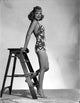 Classic portrait photo print of Joyce Compton leaning on a ladder.