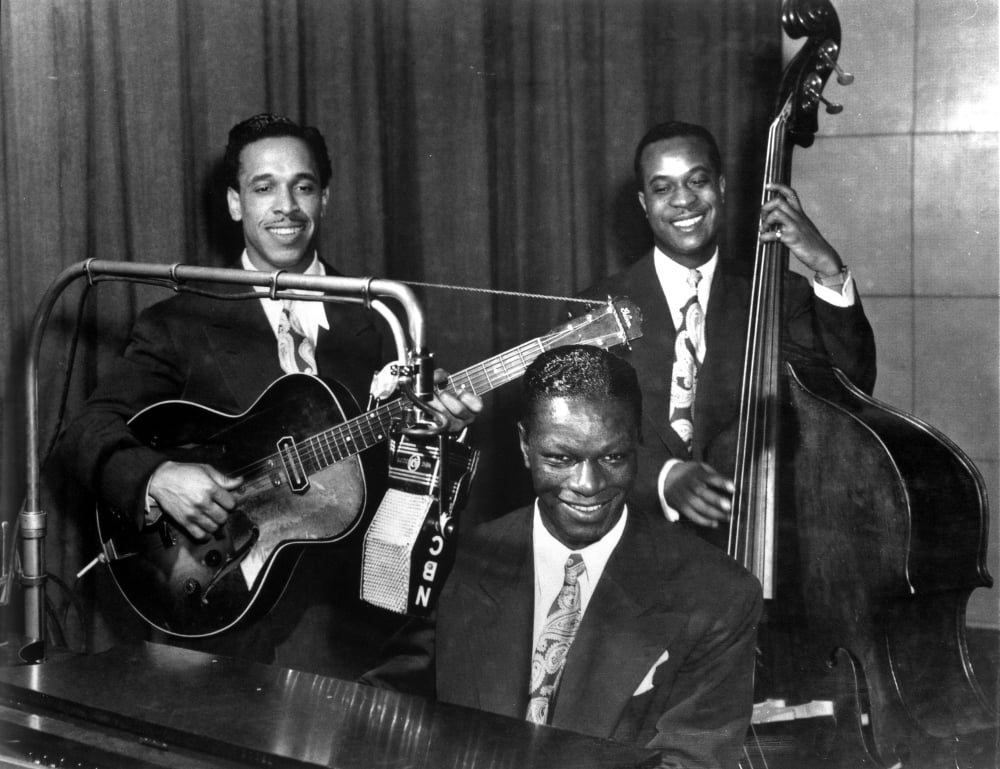 Nat King Cole performing live photo print showcasing the legendary jazz artist.