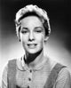 The Man Who Shot Liberty Valance photo print featuring Vera Miles in a classic Western setting.
