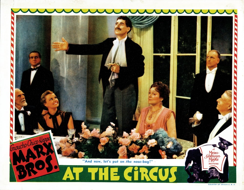 Vibrant At The Circus poster print showcasing the lively energy of circus performances.