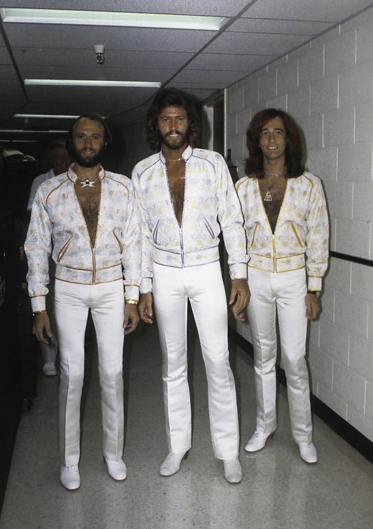 The Bee Gees photo print in white costumes, iconic music legends.