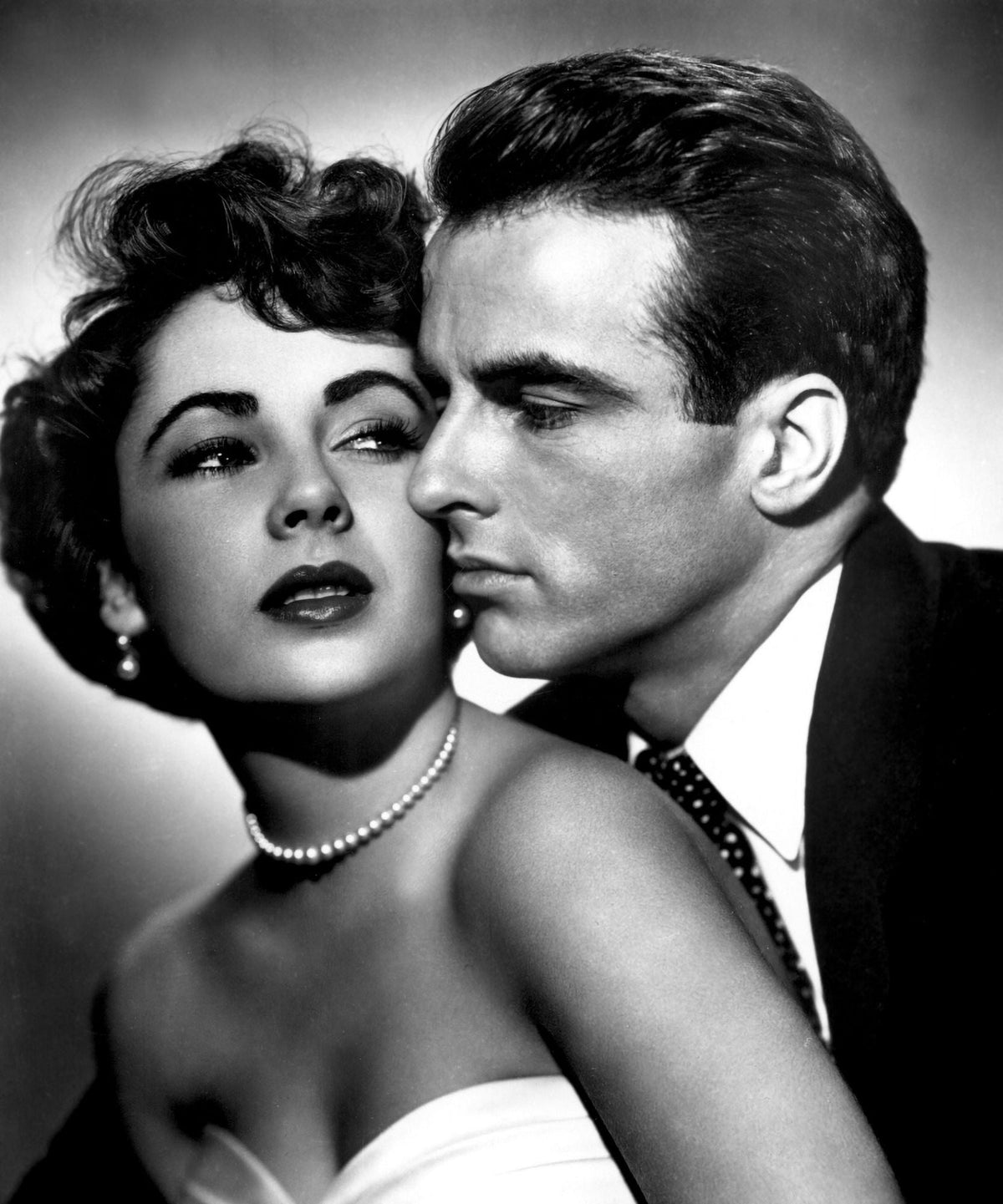 A Place In The Sun movie poster print featuring Elizabeth Taylor and Montgomery Clift.
