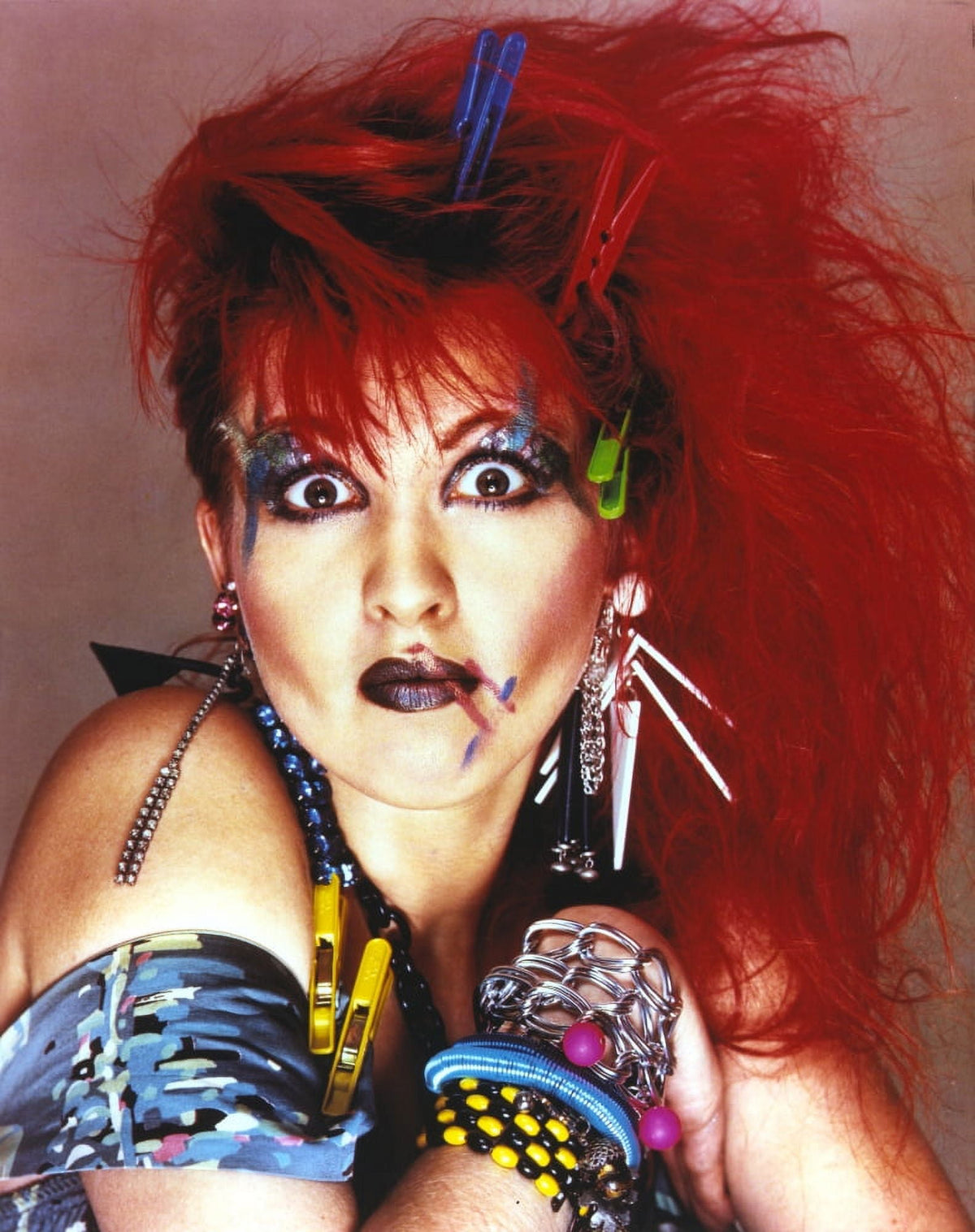 Cyndi Lauper portrait photo print featuring red hair and blue eyelashes.