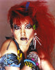 Cyndi Lauper portrait photo print featuring red hair and blue eyelashes.
