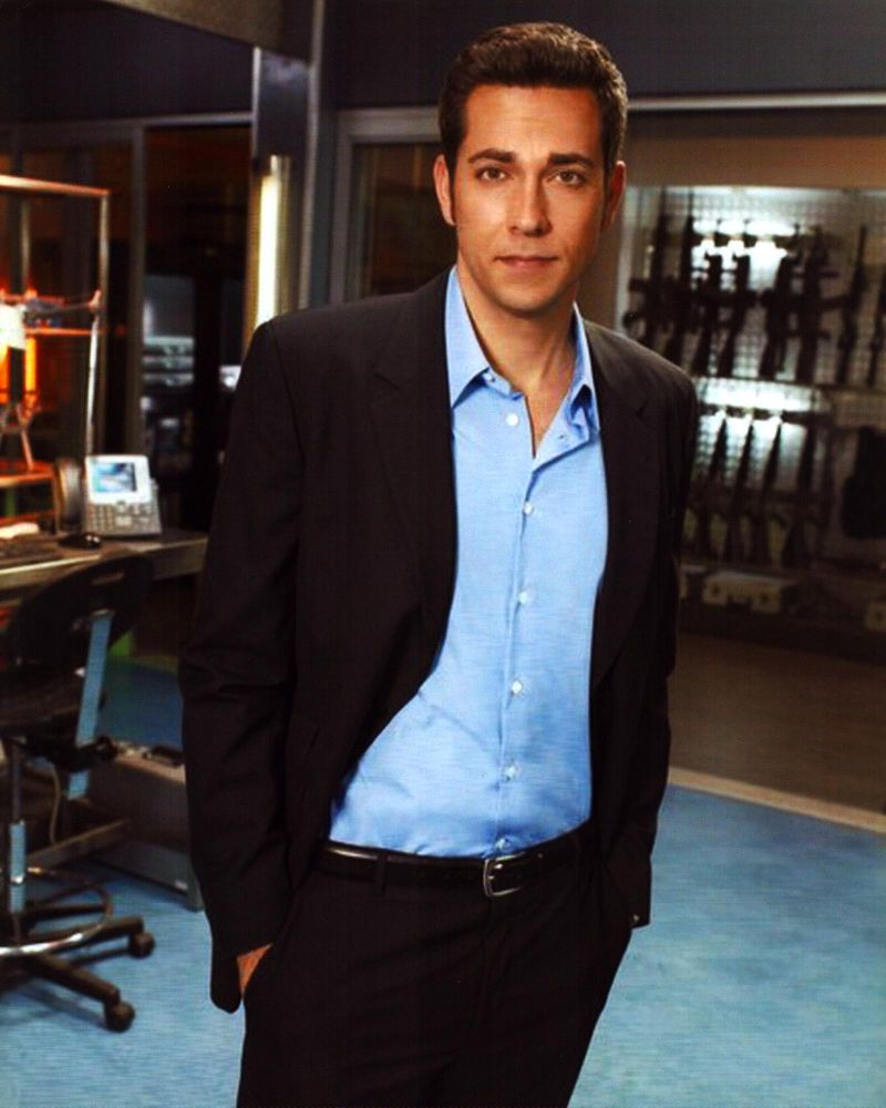 Zachary Levi photo print from Chuck TV series, hands in pockets pose.