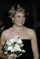 Princess Diana holding a bouquet of flowers photo print.
