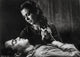 West Side Story photo print of a man lying down, vibrant theatrical scene.