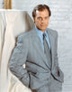 Stephen Collins posed in a gray tuxedo photo print