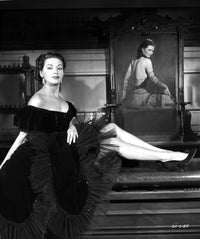 Black and white photo print of Yvonne DeCarlo in a stylish black outfit