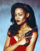 Photo print of Robin Givens holding a gun and smiling, available in multiple sizes.