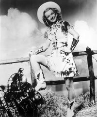 Dale Evans wearing a cowgirl costume photo print in various sizes.