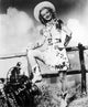 Dale Evans wearing a cowgirl costume photo print in various sizes.