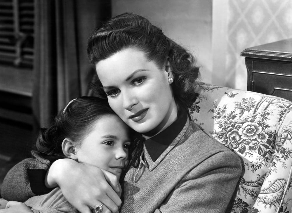 Miracle on 34th Street photo poster featuring Natalie Wood and Maureen O'Hara, 1947 classic film decor.