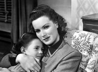 Miracle on 34th Street photo poster featuring Natalie Wood and Maureen O'Hara, 1947 classic film decor.