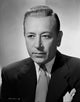 George Raft posed in a suit with an expressionless face photo print.
