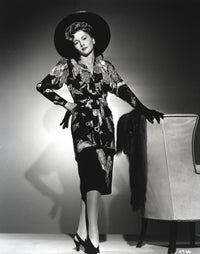 Joan Fontaine wearing a floral dress and black gloves photo print