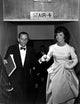 Jackie Onassis walking up stairs photo print in elegant style.