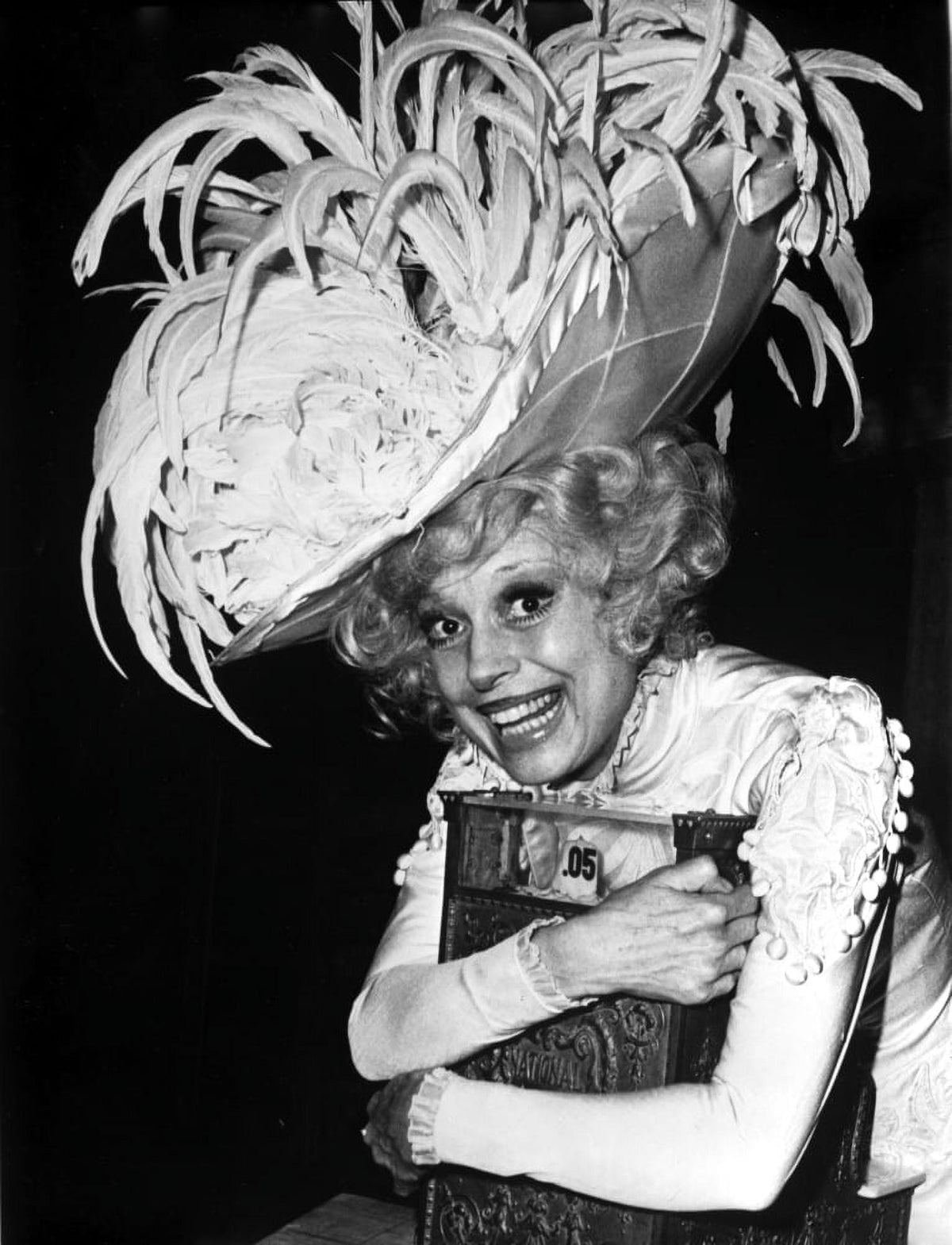 Carol Channing wearing a feathered hat photo print.