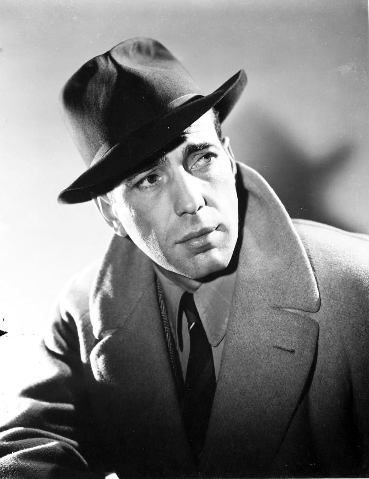 Humphrey Bogart wearing a fedora photo print.
