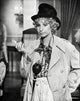 Barbra Streisand posed in stylish coat and hat photo print