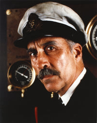 Close-up portrait photo print of Christopher Lee in navy attire.