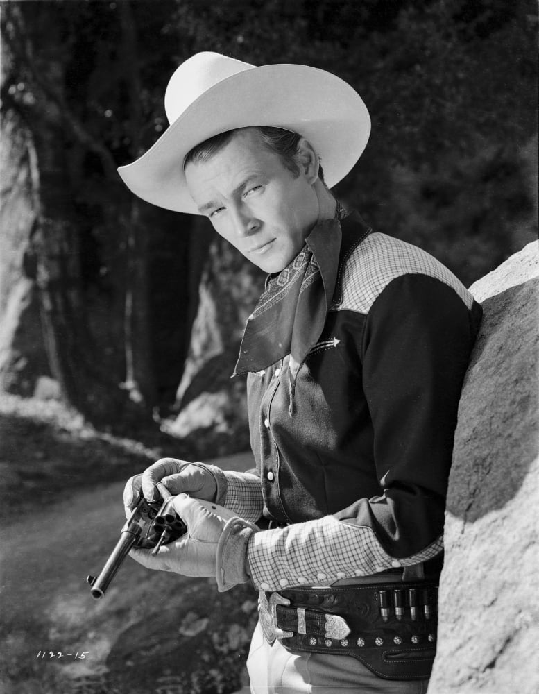 Black and white photo print of Roy Rogers in cowboy outfit.