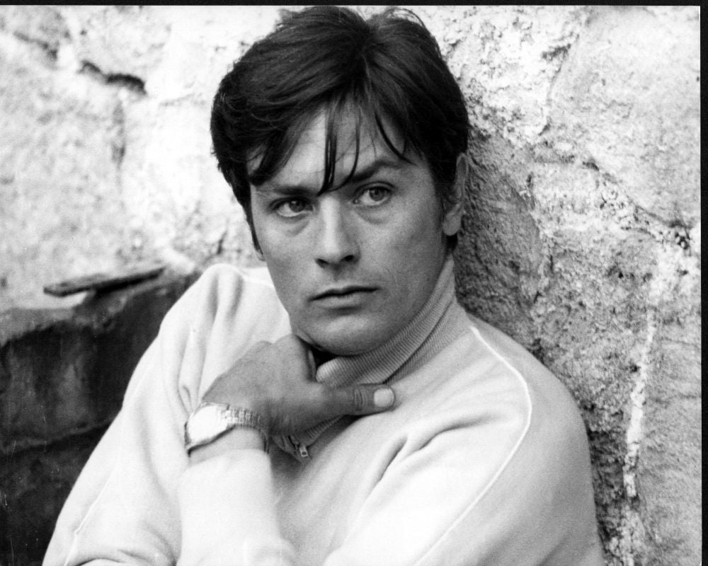 Alain Delon leaning against a wall black and white photo print