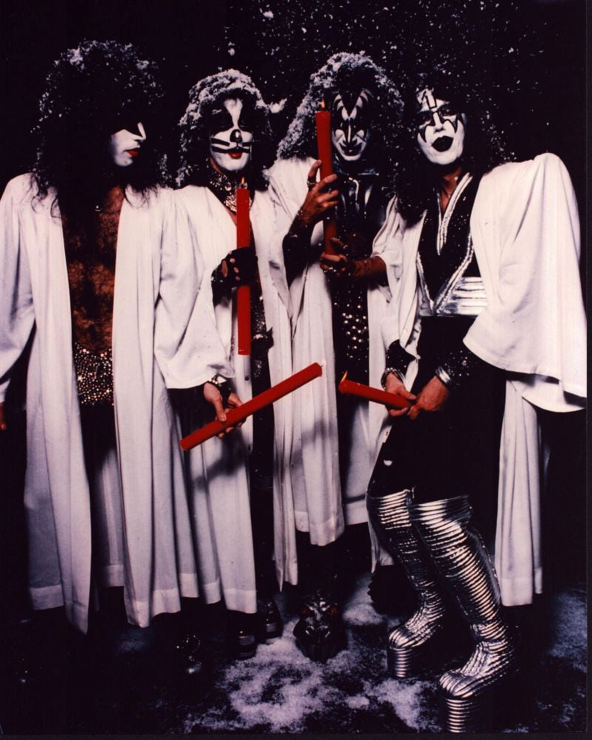 Kiss band photo print in white robes with red candles.