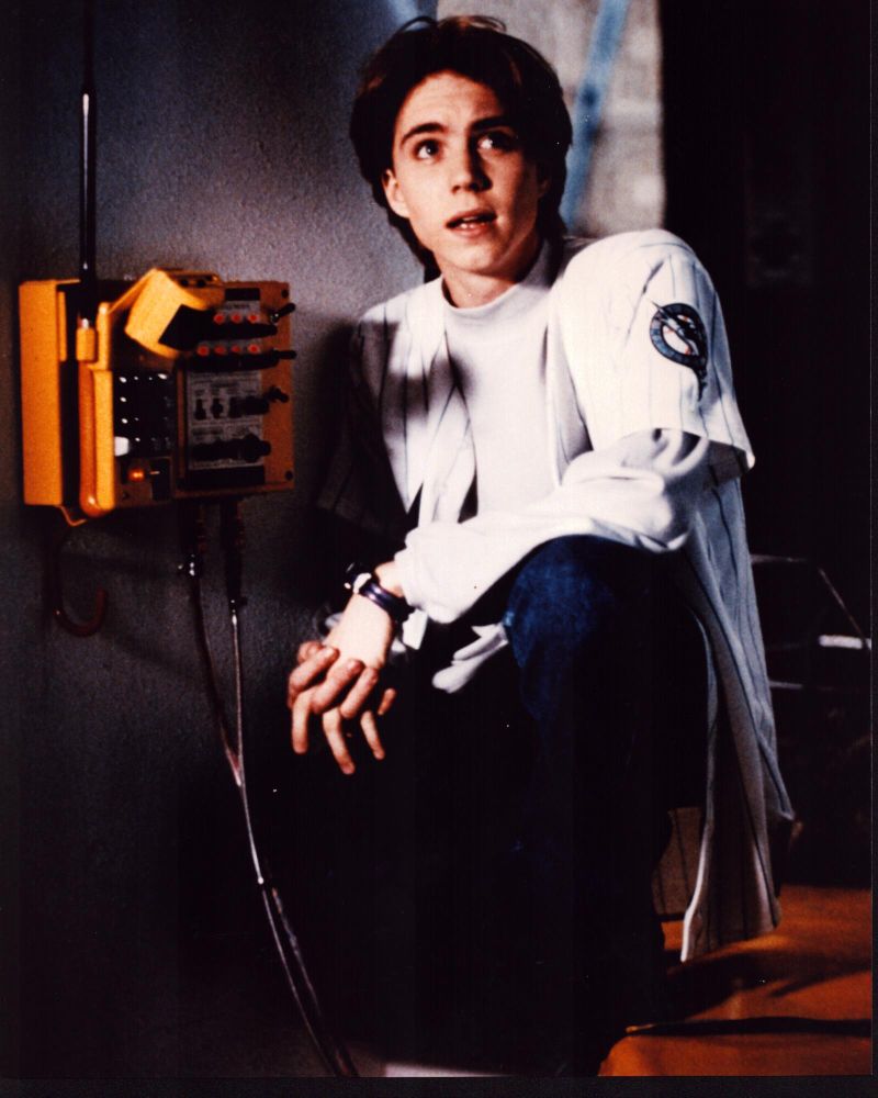 Jonathan Brandis crouching by wires in SeaQuest 2032 photo print