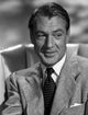 Gary Cooper smiling in a suit photo print, classic cinema art.