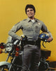 Erik Estrada holding helmet in police uniform photo print