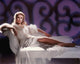 Elizabeth Montgomery photo print on white chaise, 10 x 8.