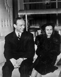 Black and white photo print of Fred Astaire seated elegantly.
