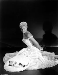 Kim Novak kneeling elegantly in a gown photo print.