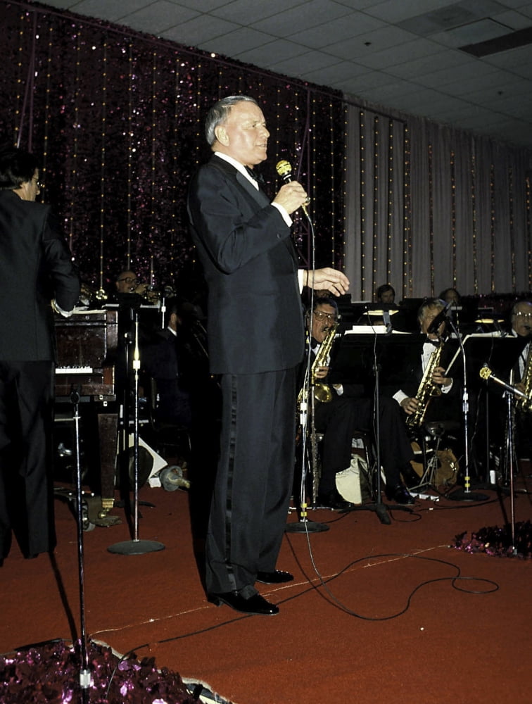 Frank Sinatra performing photo print, available in multiple sizes.