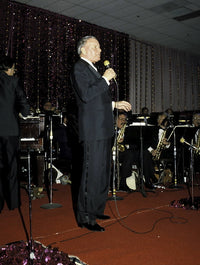 Frank Sinatra performing photo print, available in multiple sizes.
